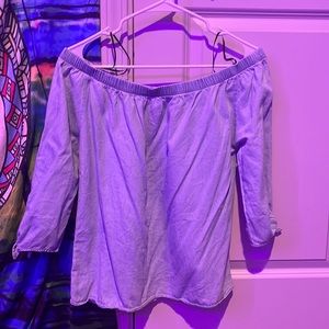 blue/ light wash demon colored off the shoulder top